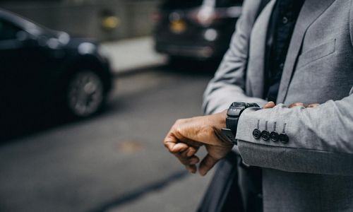 Busy man managing time effectively